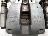 1044624-97-F Bremssattel hinten rechts MANDO für Tesla-Fahrzeuge Modell 3. Ein wichtiger B
